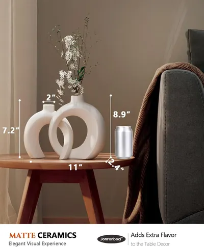 Provides exact measurements of the ceramic vases to help customers understand their size and how they'll fit in their space. Shows the vases in a real-world context, demonstrating how they can be…