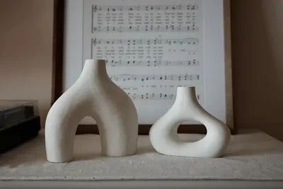 Showcases the product in a real-world context, demonstrating how it fits into a stylish, artistic home environment.