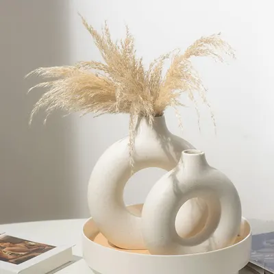 Showcases the product in a stylish, minimalist home setting to appeal to design-conscious consumers.
