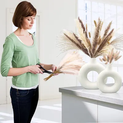 Shows the product being used in a real-world context, demonstrating how it can enhance home decor and be used for DIY floral arrangements.