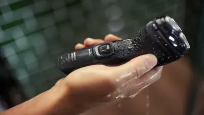 Product being used in shower to show waterproof capability