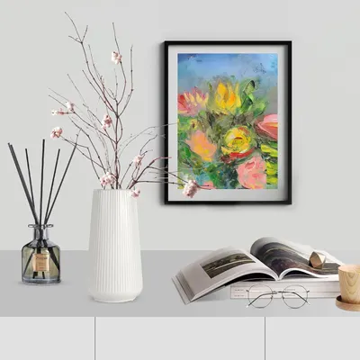 Shows how the product (framed artwork) can be incorporated into a stylish home setting to enhance the decor.