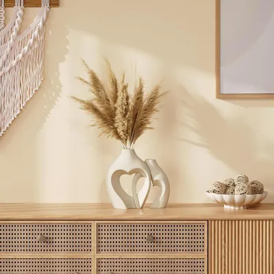 Showcases the product in a stylish, neutral-toned home setting to inspire customers and demonstrate how it fits into a modern, bohemian aesthetic.