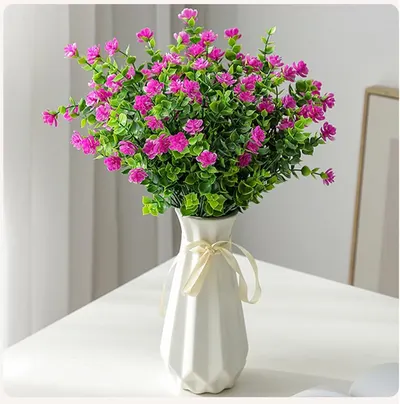 Showcases how the artificial flower arrangement can enhance home decor and create a vibrant, natural-looking display.
