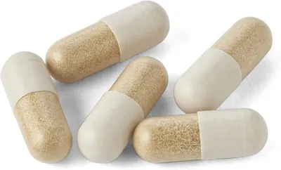 Highlights the unique two-tone design of the capsules, suggesting a dual-action or time-release formulation.
