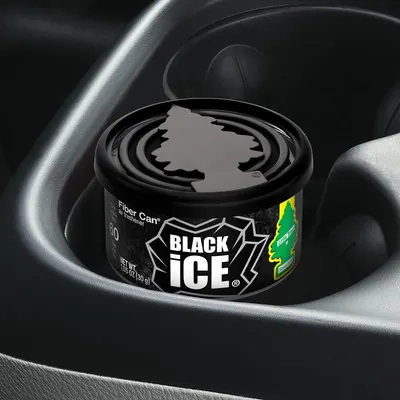 Shows the product being used in a car cup holder, demonstrating its intended application as a car air freshener. Highlights the product's compact size, fitting perfectly in a standard car cup holder.