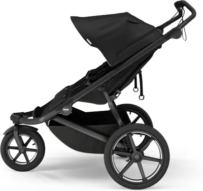 Showcases the stroller's sleek design and all-terrain capabilities, emphasizing its suitability for active parents.