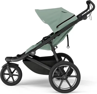 Shows the product in a clean, side-view to highlight its sleek design and functionality as a jogging stroller.