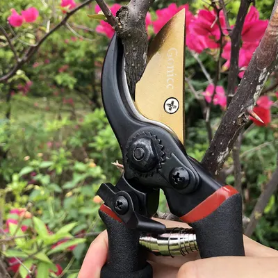 Demonstrates the product's sharp, precise cutting ability on tree branches, highlighting its effectiveness for gardening tasks.