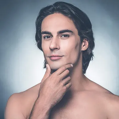 Showcases a model with clear, healthy-looking skin to demonstrate the potential results of using the product.