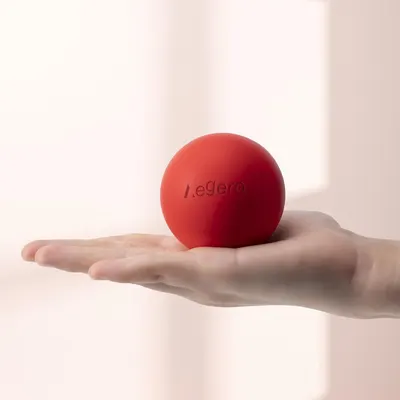 Demonstrates the product's small, portable size by showing it fitting easily in a hand.