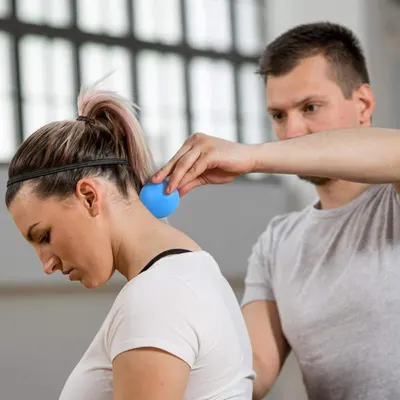 Demonstrates how to use the massage ball for neck and shoulder pain relief, showing proper technique and placement. Shows the product being used in a real-world context, emphasizing its practical…