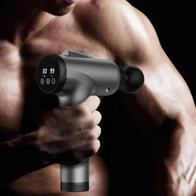 Highlights the product's digital display feature, showing precise control and monitoring of the massage gun's settings. Shows the product in use on a muscular body, demonstrating its application for…