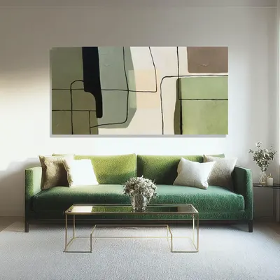 Showcases how the abstract artwork complements and enhances a contemporary living space with a green sofa.