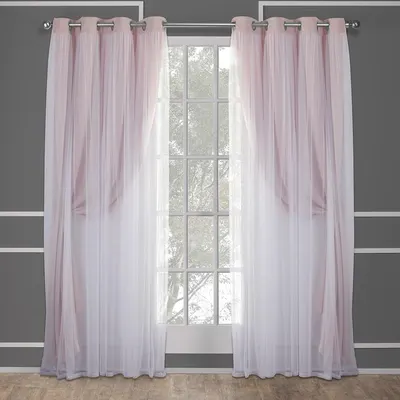 Shows the curtains in a realistic home setting to demonstrate how they look when installed and their light-filtering properties.
