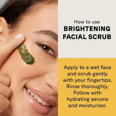 Demonstrates the correct method for applying and using a brightening facial scrub product.