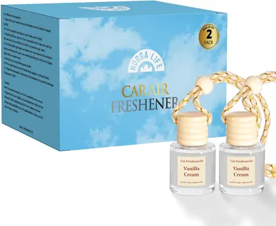 Shows the complete product package, highlighting that customers receive two vanilla cream scented car air fresheners.