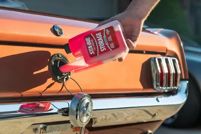 Demonstrates the product's application in maintaining classic cars, showing its effectiveness on vintage automotive surfaces.