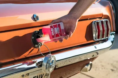 Demonstrates the ease of using the product to improve fuel efficiency or performance in classic cars.