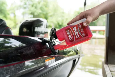 Demonstrates the practical application of the fuel stabilizer in a real-world boating scenario, showing how easy it is to use.