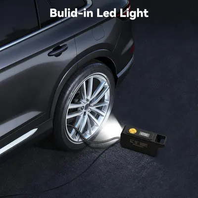 Highlights the product's built-in LED light feature, demonstrating its usefulness for illuminating tire changes or other roadside tasks in low-light conditions.