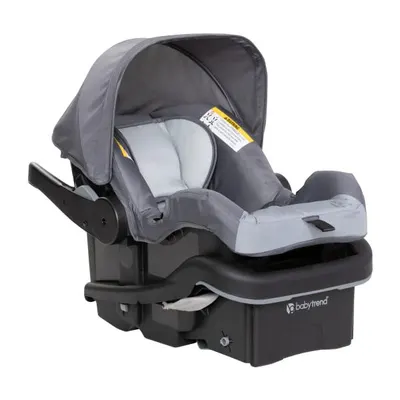 Highlights the safety features of the car seat, including the secure base and protective canopy, to reassure parents about their child's safety during travel.