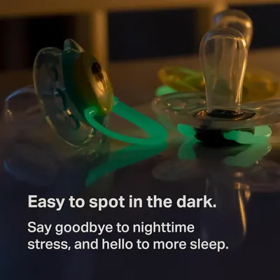 Highlights the product's ability to be easily visible in darkness, reducing stress and improving sleep for parents and children.