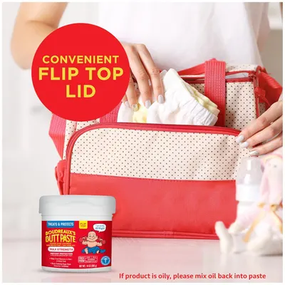 Highlights the easy-to-use flip top lid feature of the product, emphasizing convenience for parents changing diapers.