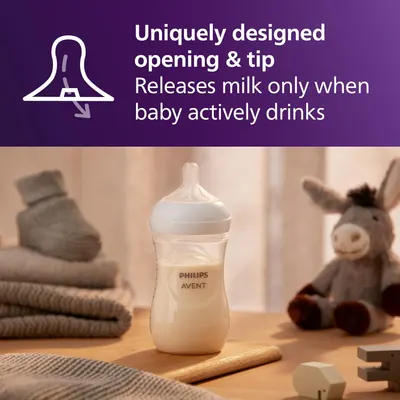 Highlights the bottle's unique design that only releases milk when the baby actively drinks, preventing spills and overfeeding.