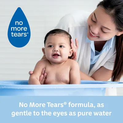 Emphasizes that the No More Tears formula is as gentle on a baby's eyes as pure water, reassuring parents of its safety during bath time.