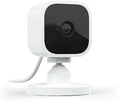 Shows the small, unobtrusive nature of the security camera in a home setting.