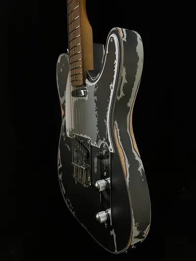 Showcases the electric guitar's design and craftsmanship in a stylized, close-up view to appeal to musicians and guitar enthusiasts.