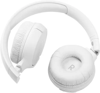 Shows the headphones in a clean, minimalist setting to highlight their sleek white design and comfortable over-ear style.