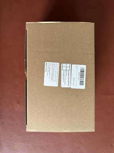 Shows the actual shipping box the customer will receive, providing reassurance about the product's packaging and delivery.