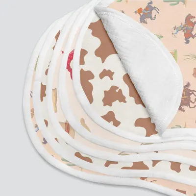 Showcases the variety of fabric patterns included in the product, likely a set of baby bibs or blankets.