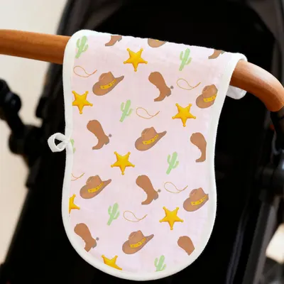 Showcases a baby product with a fun western-themed pattern, appealing to parents looking for cute and themed baby items.