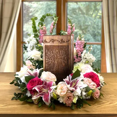 Shows the product in a real-world context as part of a memorial or remembrance display, evoking emotional connection and demonstrating respectful use.