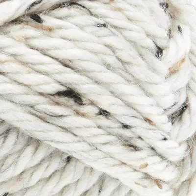 Showcases the high-quality, textured yarn material to emphasize the product's premium nature and softness.