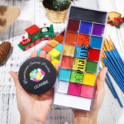 Showcases a colorful makeup palette in a festive holiday setting to appeal to shoppers looking for seasonal beauty products. Displays the complete product set, including the colorful eyeshadow…