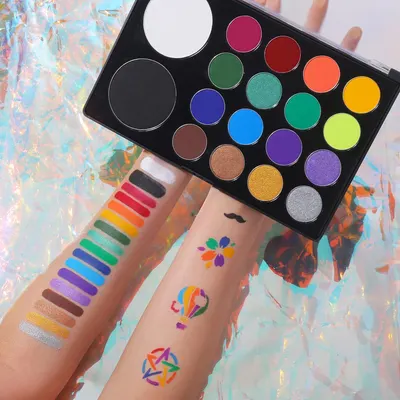 Showcases the wide range of vibrant colors available in the eyeshadow palette, demonstrating its versatility for creative makeup looks.