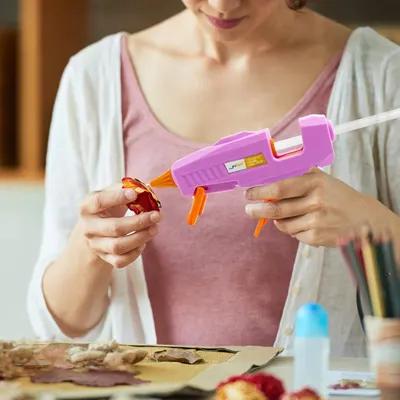 Shows the product being used in a real-world crafting scenario, demonstrating its practical application for DIY projects.