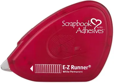 Highlights the product's ease of use with the 'E-Z Runner' feature, emphasizing convenience for scrapbooking enthusiasts.