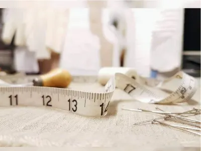 Shows the product in a real-world sewing context to demonstrate its relevance and use in crafting or tailoring activities.