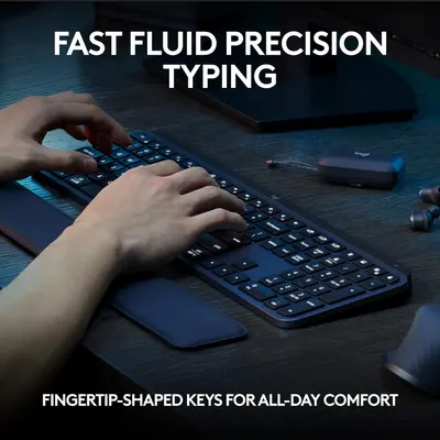 Highlights the keyboard's ergonomic design with fingertip-shaped keys for comfortable, precise typing.
