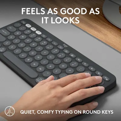 Highlights the keyboard's comfortable and quiet typing experience with round keys to appeal to users seeking an ergonomic and pleasant typing feel.