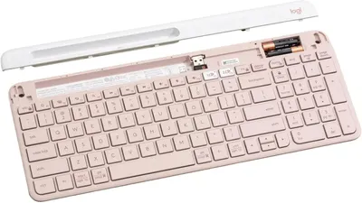 Shows the complete contents of the package, including the keyboard, batteries, and wireless receiver, to inform customers of everything they'll receive.