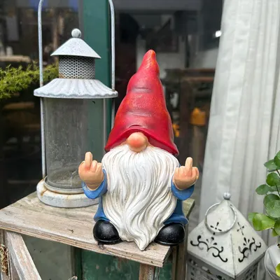 To showcase a quirky, attention-grabbing garden decoration that adds personality to outdoor spaces.