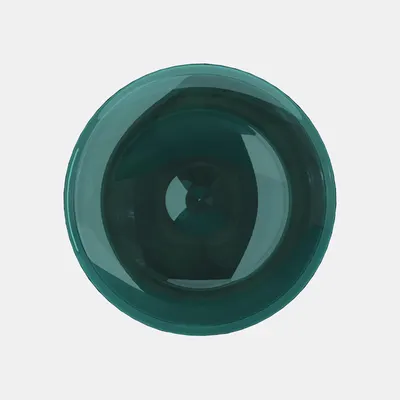 Showcases the vibrant teal color of the product, likely a plate or bowl.