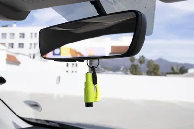 Highlights the product's role as a safety device for breaking car windows in emergencies.
