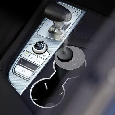 This image breaks down the car center console control interface by highlighting the drive mode selector dial and its relationship to the console controls, helping shoppers understand the product's…